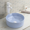 El cuarto de baño de la encimera de la mancha hunde el lavabo de mano redondo azul resistente al rayado del lavado